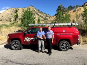 Kenny Meyer (Left) receiving his award plaque from Territorial Sales Manager Eric Henderson (Right)